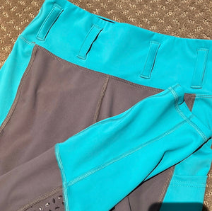 Child’s teal and grey tights