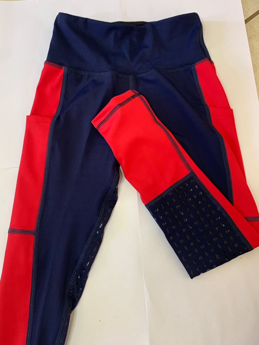 Child’s navy and red tights